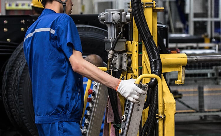 Technician Servicing Equipment
